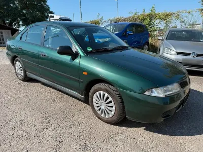 Gebraucht Mitsubishi Carisma 90 PS (66 kW) 1999 Grün Limousine