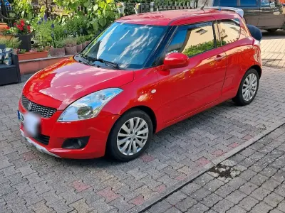 Gebraucht Suzuki Swift Comfort 94 PS (69 kW) 2013 Rot Kleinwagen