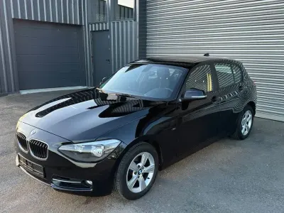 Gebraucht BMW 118 Sport Line 170 PS (125 kW) 2012 Schwarz Kleinwagen