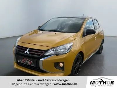 Gebraucht Mitsubishi Space Star Select+ 71 PS (52 kW) 2023 Citringelb / pianoschwarz Kleinwagen