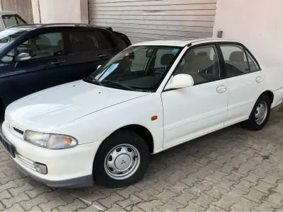 Gebraucht Mitsubishi Lancer Top 113 PS (83 kW) 1992 Weiß Limousine