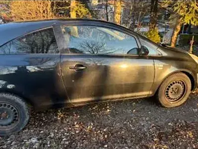 Używany Opel Corsa Edition 87 KM (63 kW) 2012 Czarny Hatchback