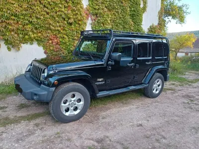 Käytetty Jeep Wrangler Sahara 200 HP (147 kW) 2014 Musta Katumaasturi