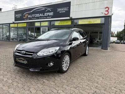 Gebraucht Ford Focus Titanium 182 PS (133 kW) 2014 Pantherschwarz metallic Kombi