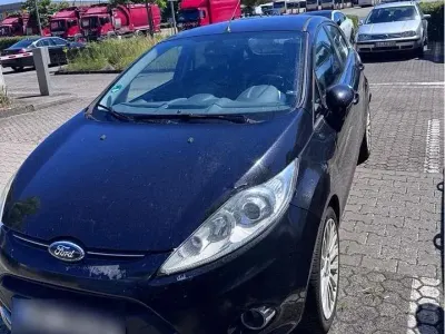 Gebraucht Ford Fiesta 95 PS (69 kW) 2011 Schwarz Kleinwagen