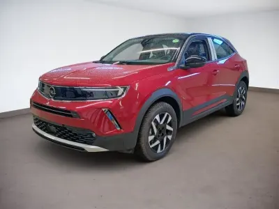 Gebraucht Opel Mokka-e Elegance 100 kW (136 PS) 2023 Kosmosrot/diamantschwarz SUV