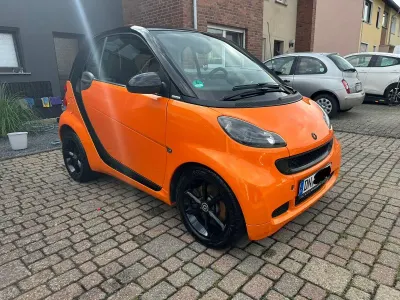 Używany Smart ForTwo Coupé 71 KM (52 kW) 2011 Pomarańczowy Coupe