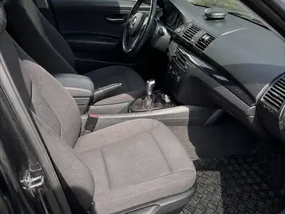 Używany BMW 116 122 KM (89 kW) 2007 Czarny Hatchback