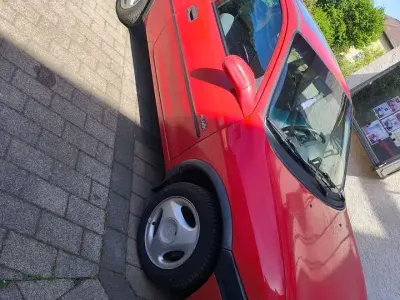 Gebraucht Opel Corsa 60 PS (44 kW) 1996 Rot Kleinwagen