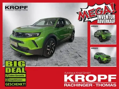Gebraucht Opel Mokka Elegance 101 PS (74 kW) 2024 Lackierung matcha green/typ au SUV