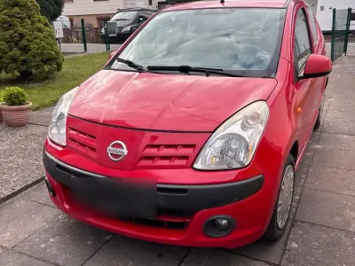 Gebraucht Nissan Pixo 65 PS (47 kW) 2009 Rot Kleinwagen