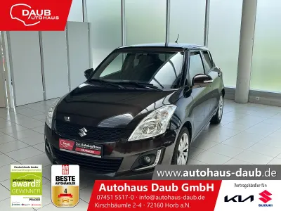 Gebraucht Suzuki Swift Comfort 94 PS (69 kW) 2015 Bison brown metallic Kleinwagen