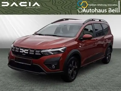 Gebraucht Dacia Jogger Expression 94 PS (69 kW) 2025 Terracottabraun metallic Van / Kleinbus