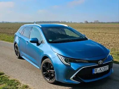 Gebraucht Toyota Corolla Hybrid Lounge 2019 Blau Kombi