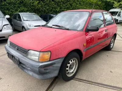 Gebraucht Toyota Starlet XLi 75 PS (55 kW) 1993 Rot Kleinwagen