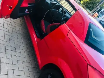Używany Opel Tigra Enjoy 125 KM (91 kW) 2006 Czerwony Kabriolet