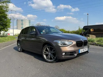 Gebraucht BMW 118 Sport Line 170 PS (125 kW) 2015 Bronze Kleinwagen
