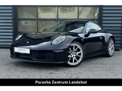 Gebraucht Porsche 911 Carrera 394 PS (289 kW) 2025 Tiefschwarzmetallic Coupé