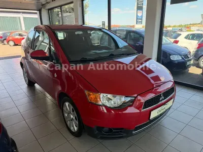 Gebraucht Mitsubishi Colt 95 PS (69 kW) 2011 New red Kleinwagen