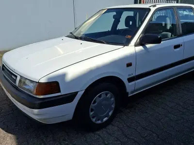 Gebraucht Mazda 323 84 PS (61 kW) 1990 Weiß Limousine