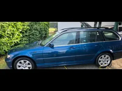 Gebraucht BMW 318 143 PS (105 kW) 2004 Blau Kombi