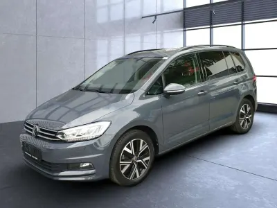 Gebraucht VW Touran Comfortline 150 PS (110 kW) 2024 Delfingrau Van / Kleinbus