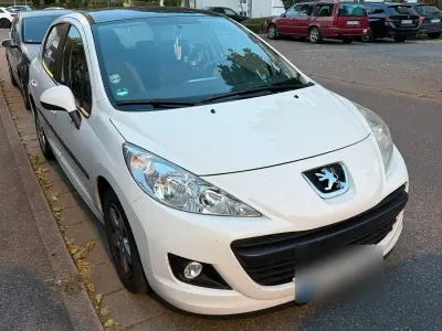Gebraucht Peugeot 207 95 PS (69 kW) 2011 Weiß Kleinwagen