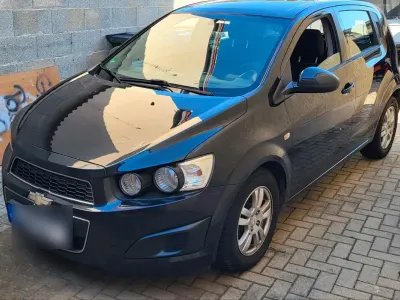 Gebraucht Chevrolet Aveo 101 PS (74 kW) 2012 Schwarz Kleinwagen