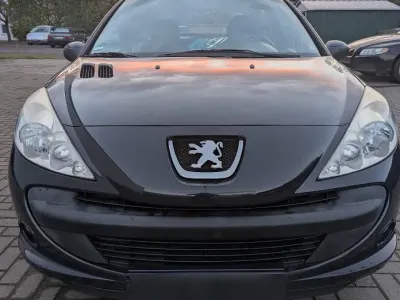 Gebraucht Peugeot 206 60 PS (44 kW) 2011 Grau Kleinwagen