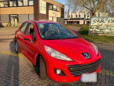 Gebraucht Peugeot 207 75 PS (55 kW) 2011 Rot Kleinwagen