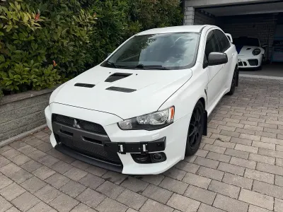 Gebraucht Mitsubishi Lancer 400 PS (294 kW) 2008 Weiß Limousine