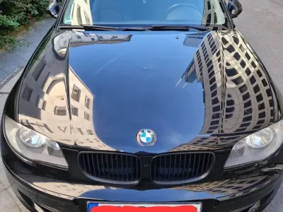 Gebraucht BMW 116 122 PS (89 kW) 2008 Schwarz Kleinwagen