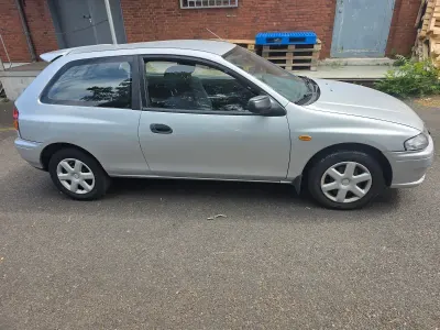Gebraucht Mazda 323 88 PS (64 kW) 2000 Grau Kleinwagen