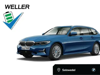 Gebraucht BMW 330e Comfort Edition 292 PS (214 kW) 2022 Phytonicblau (blau) Kombi