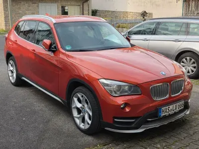 Używany BMW X1 xLine 150 KM (110 kW) 2014 Pomarańczowy SUV