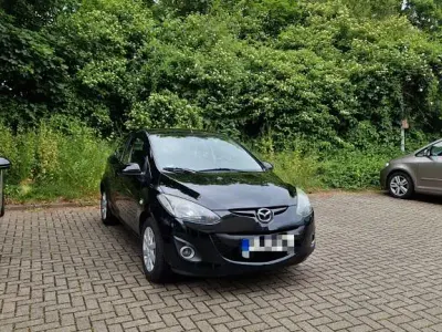 Gebraucht Mazda 2 Active 75 PS (55 kW) 2010 Schwarz Kleinwagen