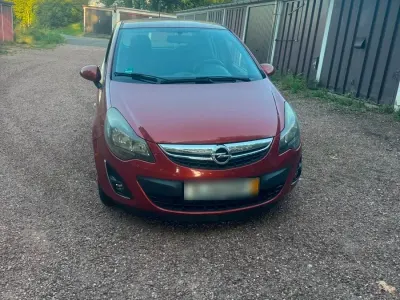 Gebraucht Opel Corsa 87 PS (63 kW) 2013 Orange Kleinwagen