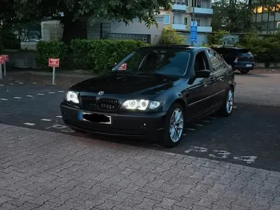 Używany BMW 318 143 KM (105 kW) 2004 Czarny Sedan/Limuzyna