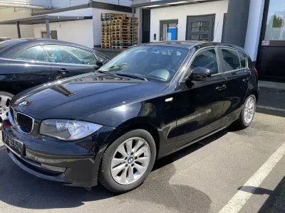Gebraucht BMW 116 122 PS (89 kW) 2010 Schwarz Kleinwagen