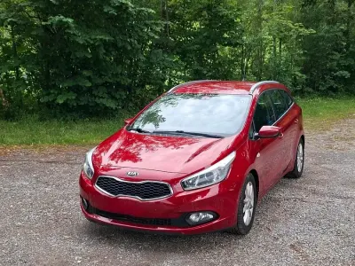 Gebraucht Kia Ceed 90 PS (66 kW) 2014 Rot Kleinwagen