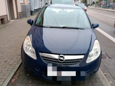 Używany Opel Corsa 66 KM (48 kW) 2009 Niebieski Hatchback