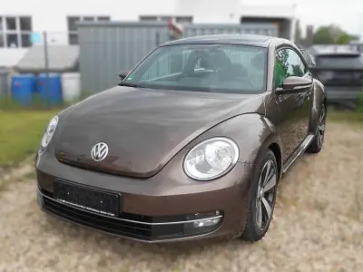 Gebraucht VW Beetle Design 105 PS (77 kW) 2012 Braun Kleinwagen