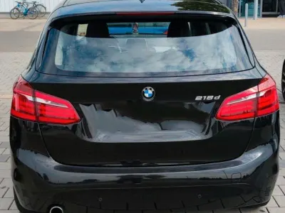 Używany BMW 218 Active Tourer Comfort Edition 150 KM (110 kW) 2015 Czarny Minivan