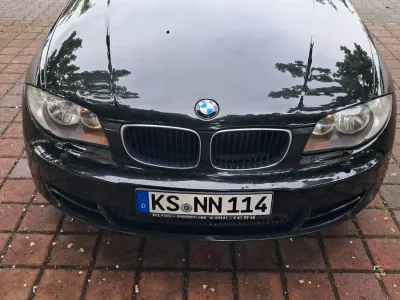 Używany BMW 116 122 KM (89 kW) 2007 Czarny Hatchback