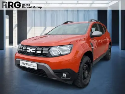 Używany Dacia Duster Journey 101 KM (74 kW) 2023 Pomarańczowy SUV