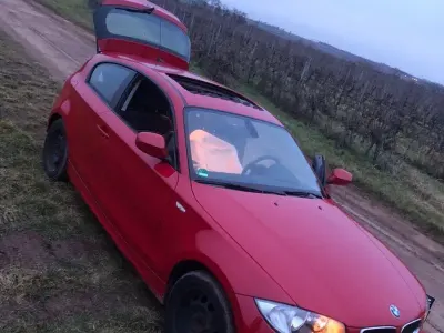 Używany BMW 116 122 KM (89 kW) 2011 Czerwony Hatchback