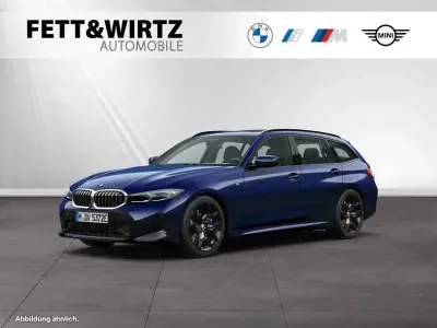 Gebraucht BMW 330e M Sport 292 PS (214 kW) 2025 Bmw individual tansanitblau metallic Kombi
