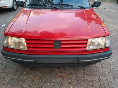 Gebraucht Peugeot 309 75 PS (55 kW) 1992 Rot Kleinwagen