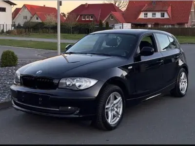 Gebraucht BMW 116 122 PS (89 kW) 2010 Schwarz Kleinwagen