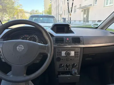 Używany Opel Meriva 110 KM (80 kW) 2008 Czarny Minivan